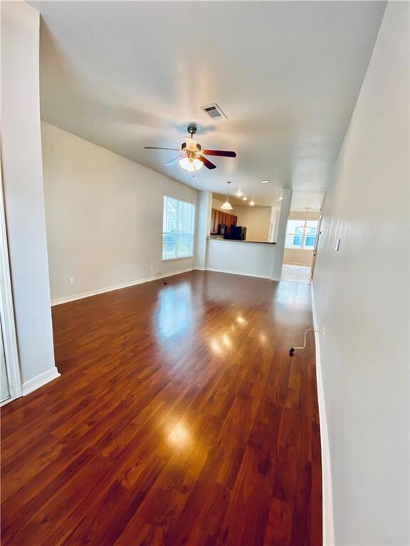 Large open concept living and dining area with lam