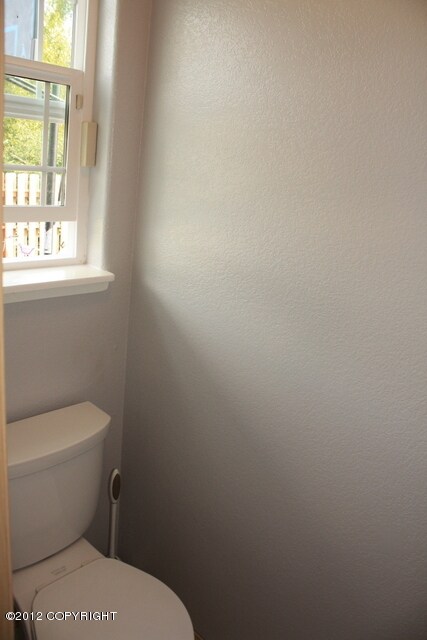 Private Toilet Area w/door in Maste Bath