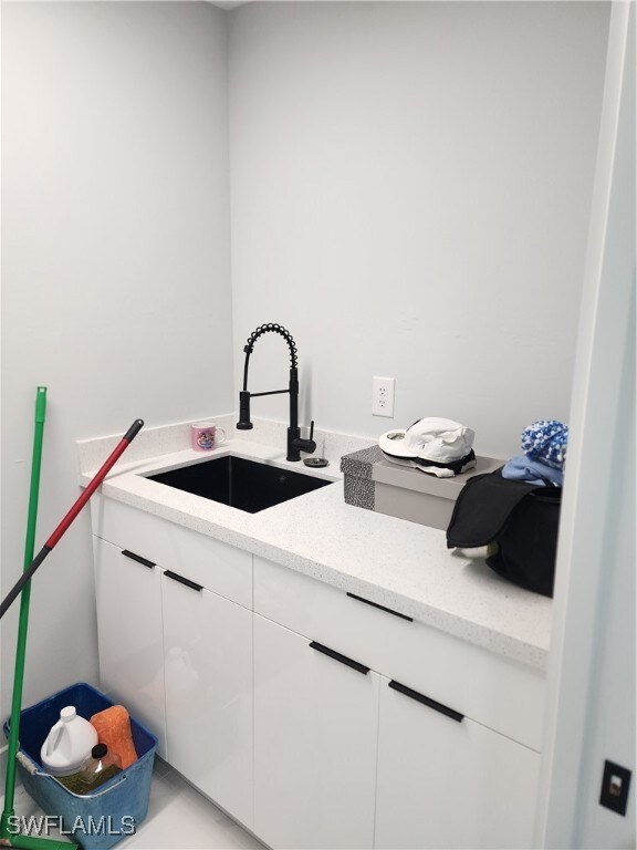 Laundry room with sink