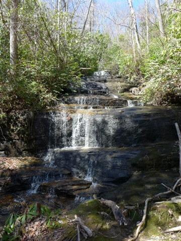 75 unrestricted acres with long range views, water