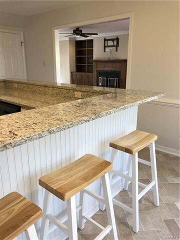 Kitchen flows right into Family Room. Great view o