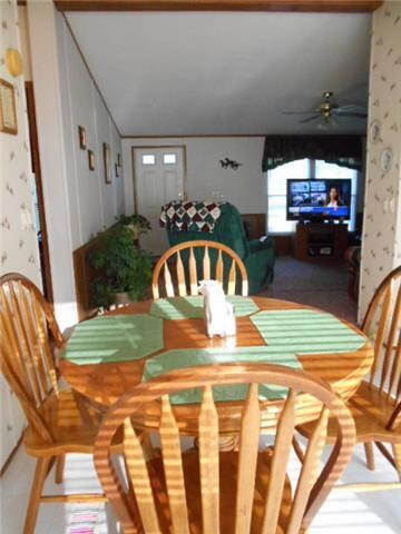 You can see the living room is open to dining area