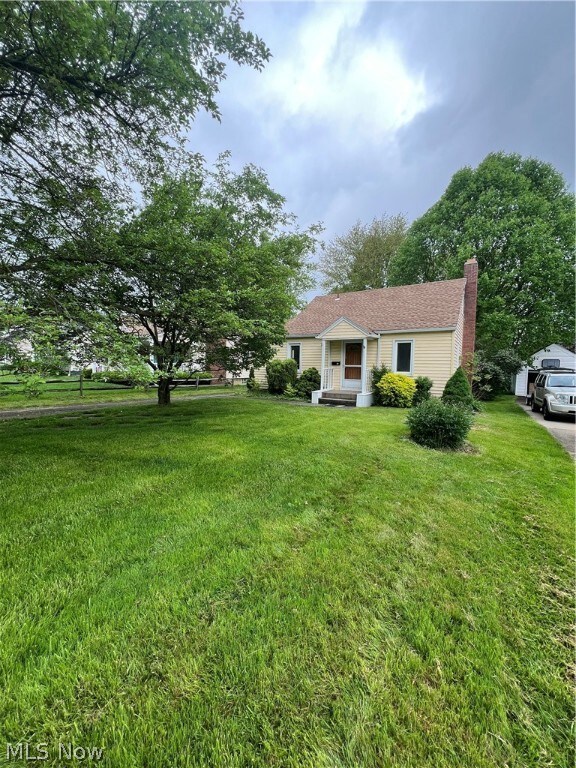 View of front of home with a front yard