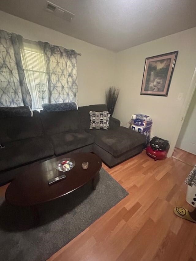 Living room with wood finished floors