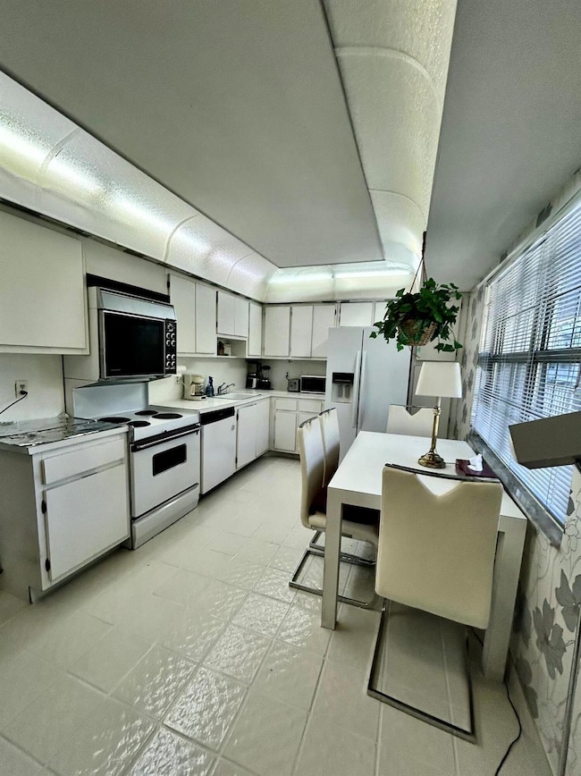 4020 W Palm Aire Dr unit 410, Pompano Beach, FL 33069 - photo 2