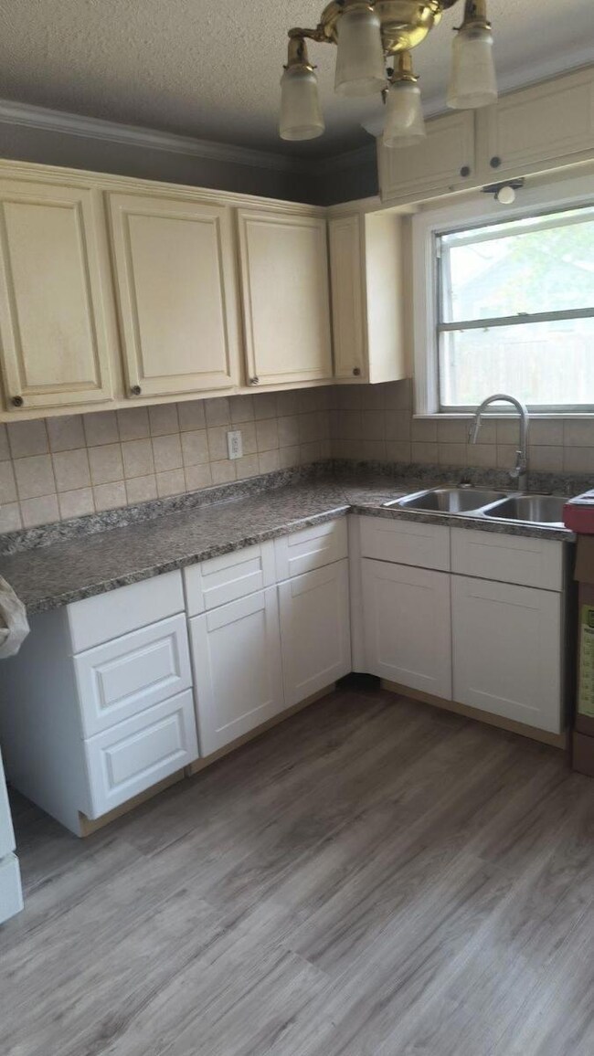 Kitchen featuring light hardwood / wood-style floo
