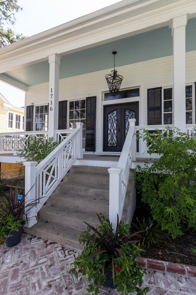 Wide front steps lead to front porch.