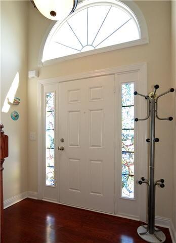 Entrance foyer with cherry hardwood floors 
