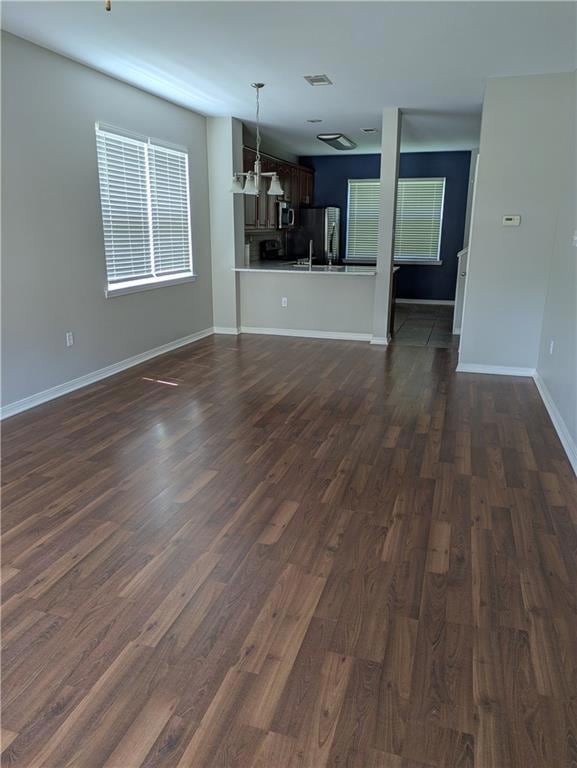 Living/dining open to kitchen.