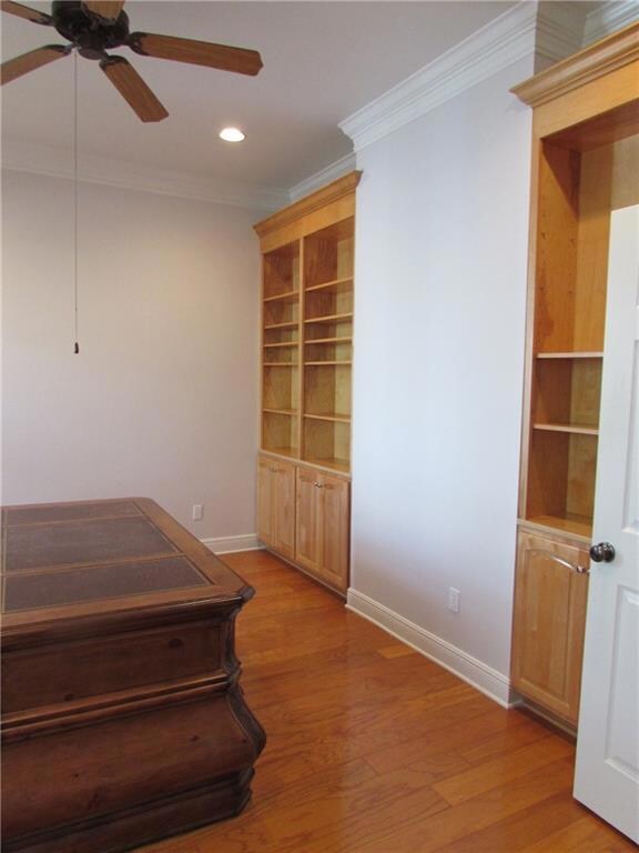 Built-in bookcases make this front room great for