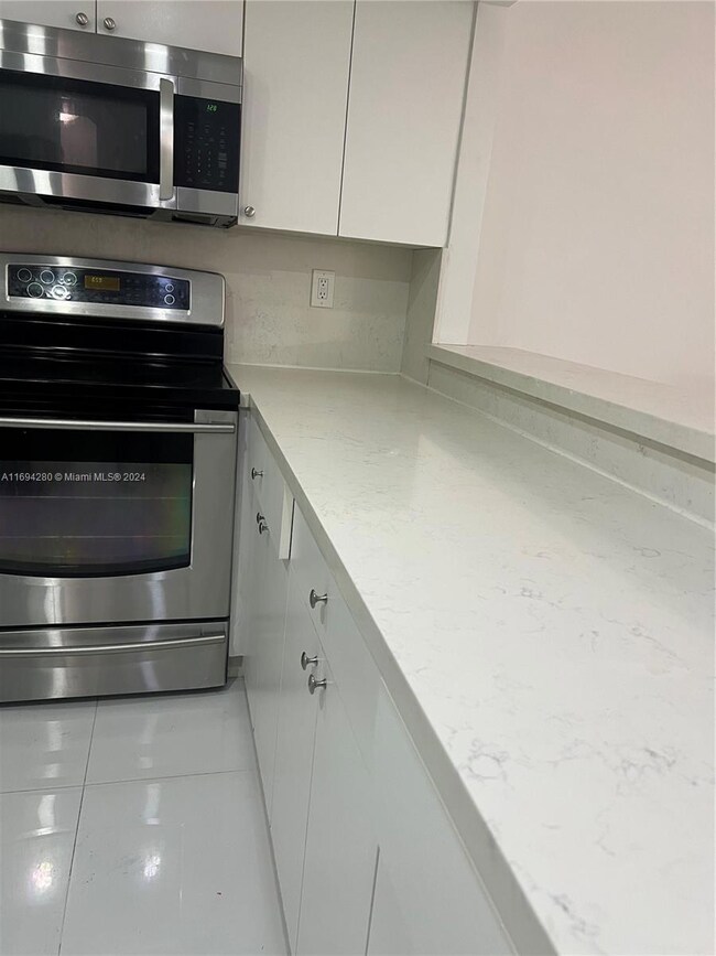 4388 W 10th Ln unit 59, Hialeah, FL 33012 - photo 3