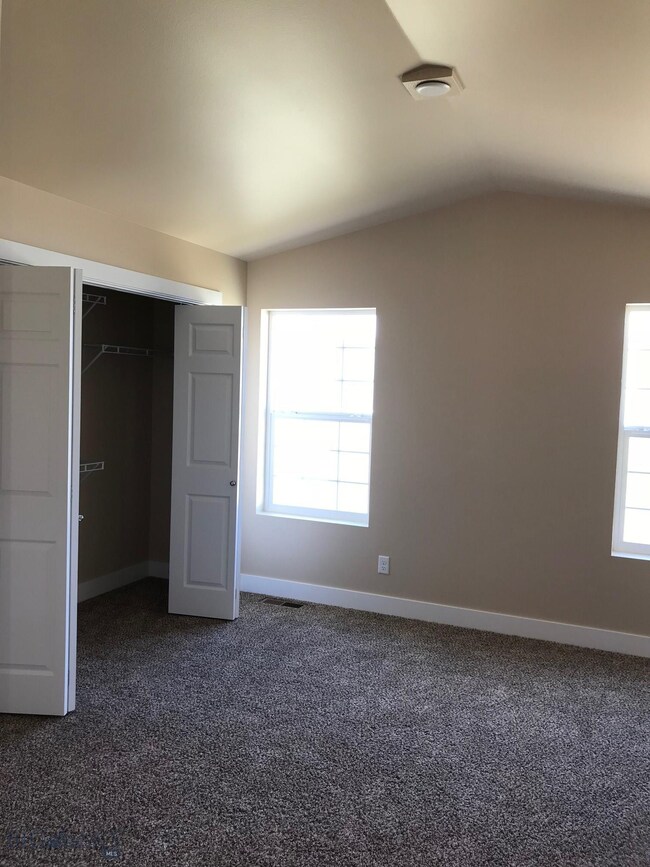 Master bath. Photo of similar home.