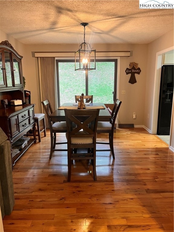 Dining Room with exterior sliding door exit to bac