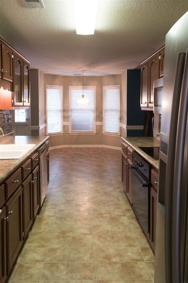 Stainless steel refrigerator, dishwasher and micro