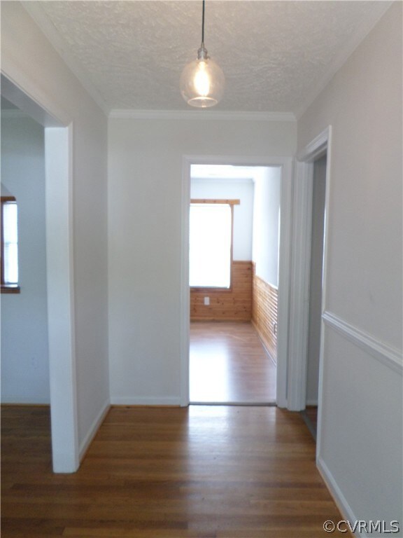Front foyer with refinished hardwood floors and ne