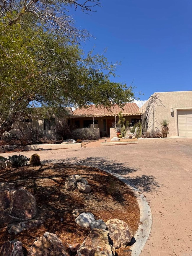 Front exterior with yard on 0.39 acre lot