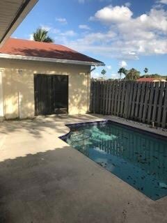 4385 Woodstock Dr unit C, West Palm Beach, FL 33409 - photo 2