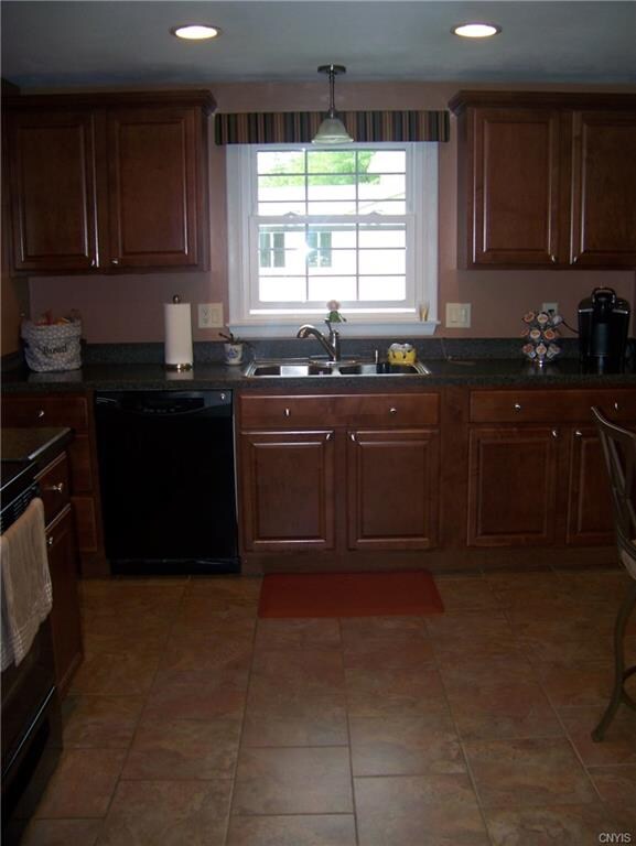 New Walnut cabinets, floors & appliances make this