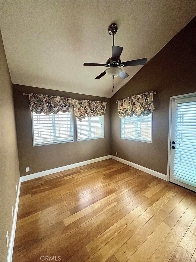 One of the 2 downstairs bedrooms has a door into the front courtyard.