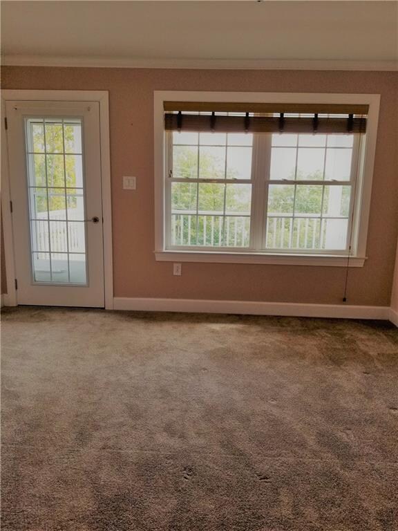 Living area with doorway to covered porch  - view 