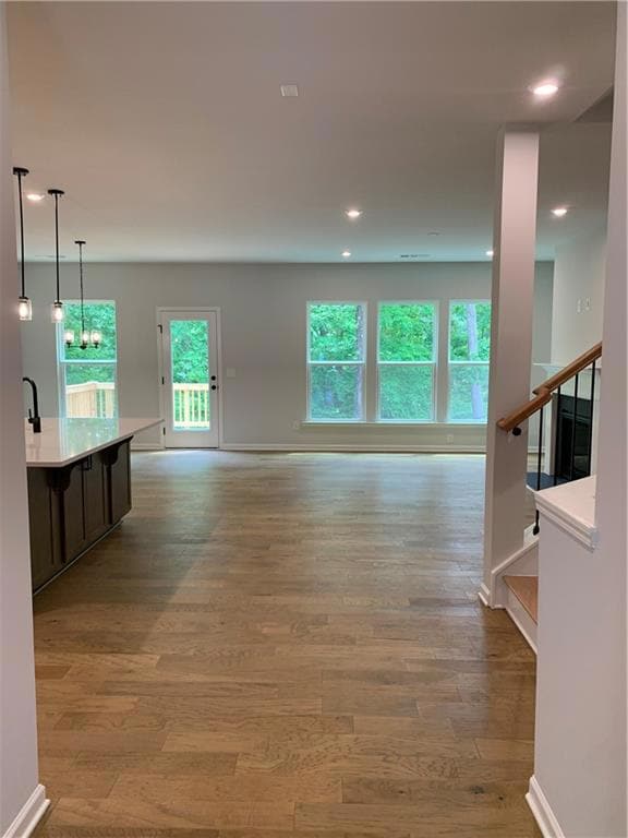 View of gathering/kitchen/cafe area from foyer