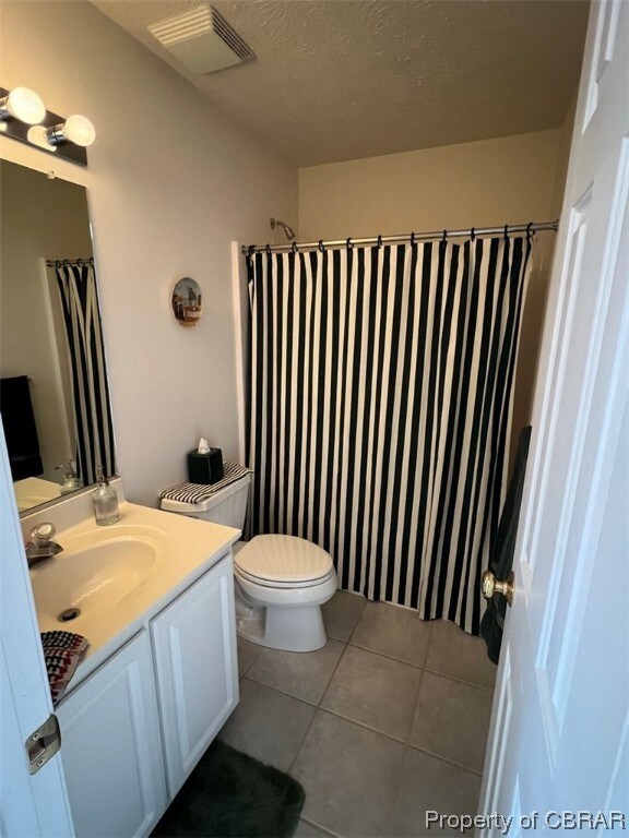 Bathroom featuring  tile floors, and vanity with c