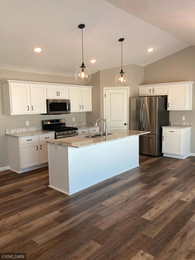 Light and bright kitchen with towering ceilings!