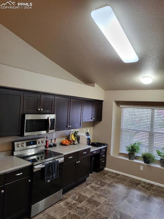 Living room with ceiling fan with notable chandeli