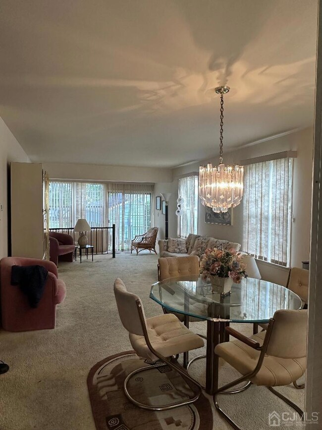 Dining Room and long living room. Added sunlight from the end unit windows.