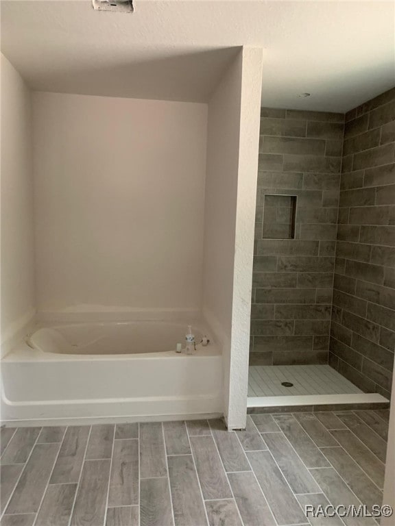 Owners bath, garden tub separate tile shower