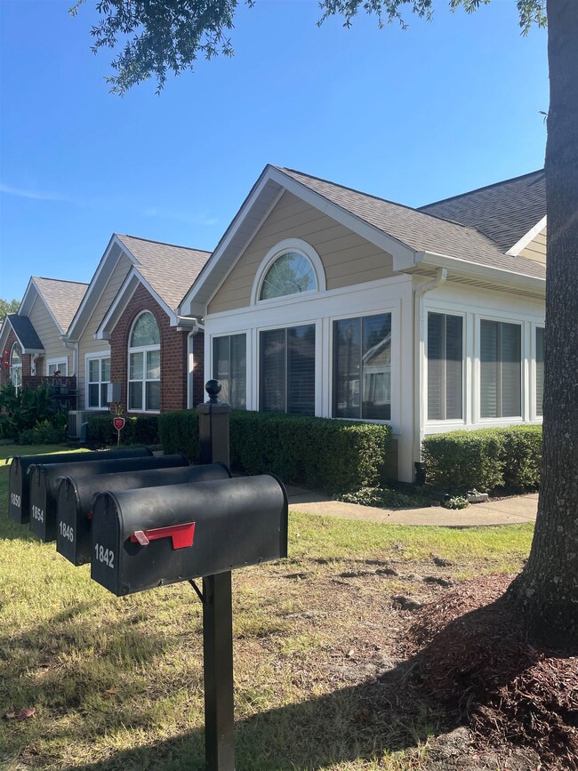 View of home's exterior with a lawn
