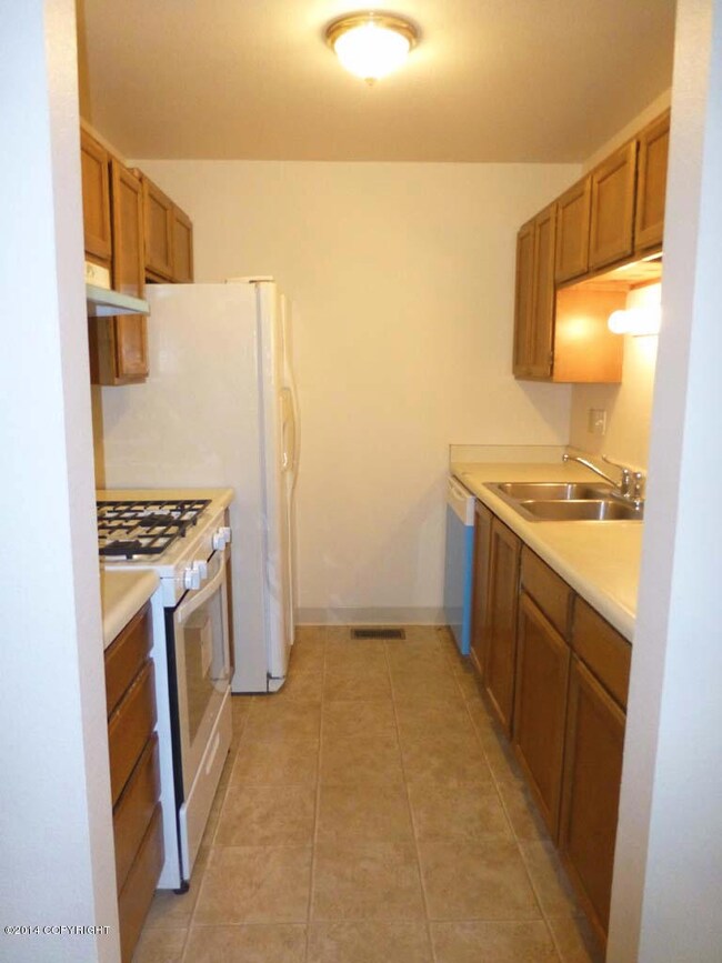 Kitchen with New Stove and Dishwasher