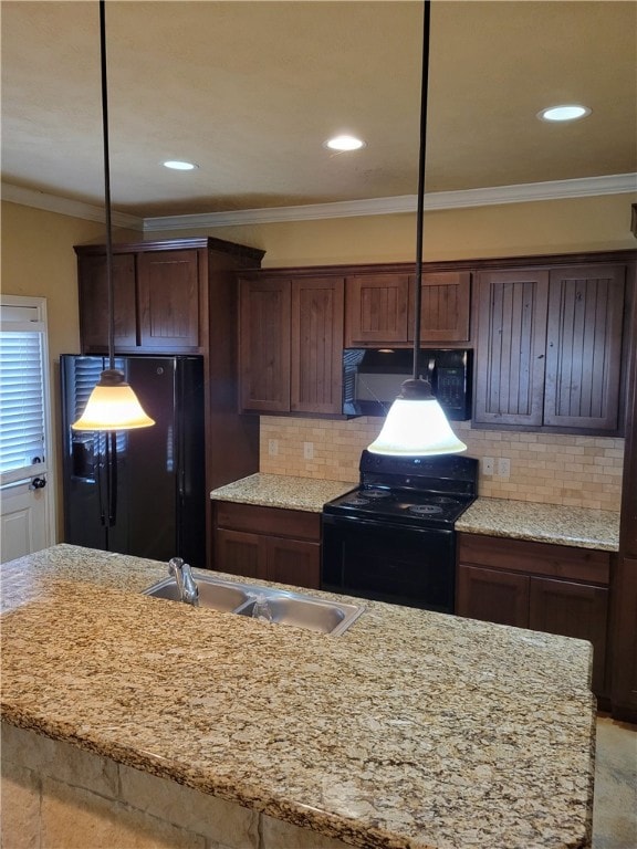 Kitchen with a sink, decorative backsplash, black