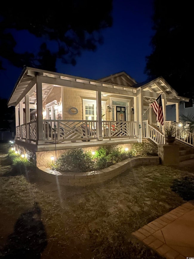 View of front of property with a porch