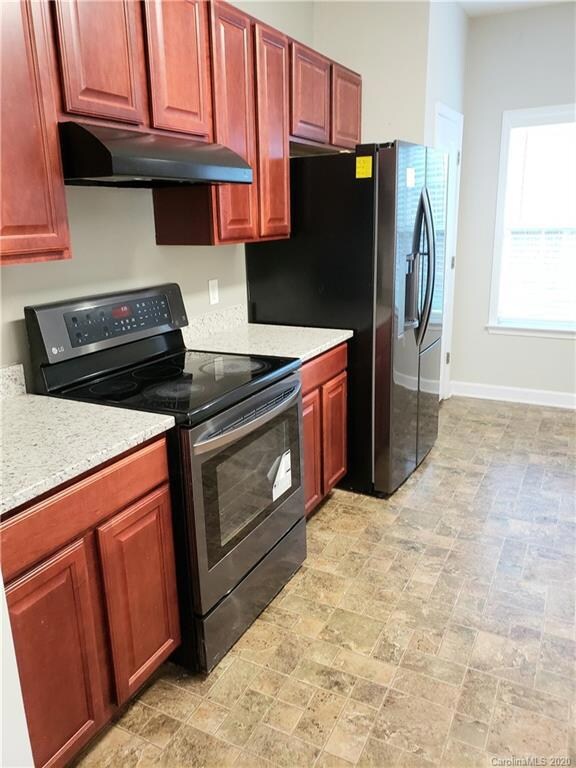 Newer range and refrigerator. The microwave was removed but one be installed. The previous owner wanted more venting when cooking. The duct work was added but could be removed.