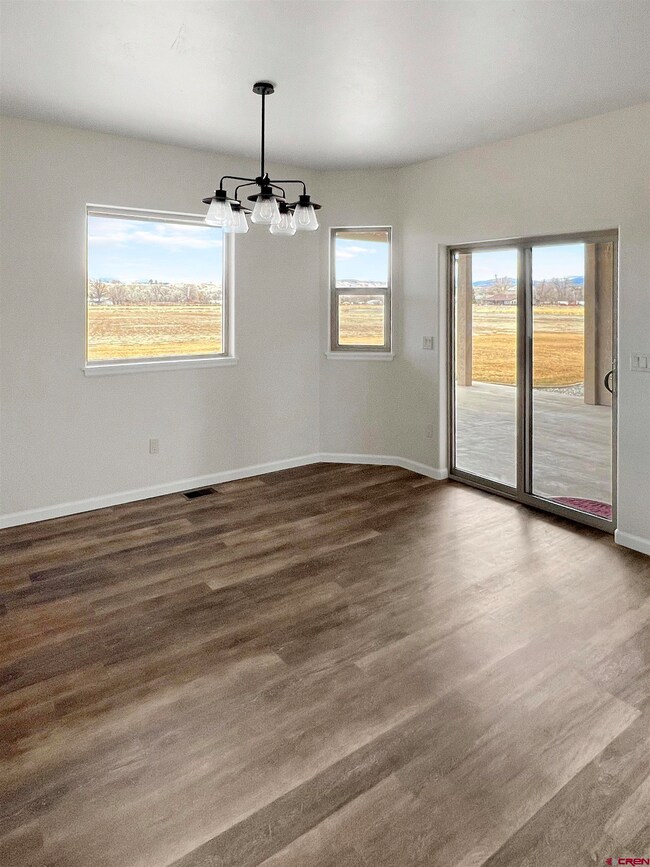 Spacious dining area open to kitchen with exterior