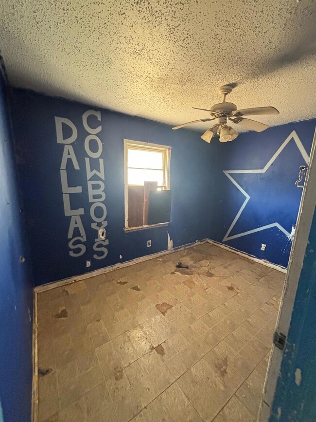 Empty room with tile patterned flooring, ceiling f
