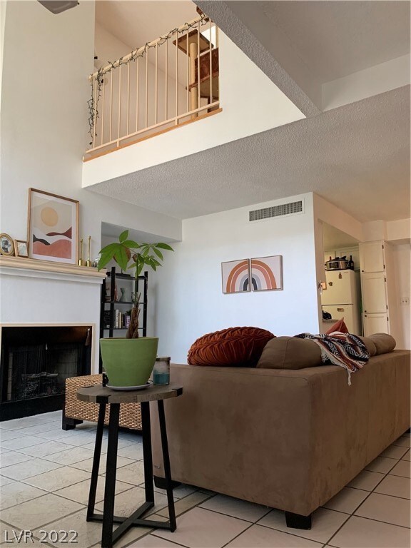 LIVING ROOM OPEN TO UPSTAIRS LOFT AREA