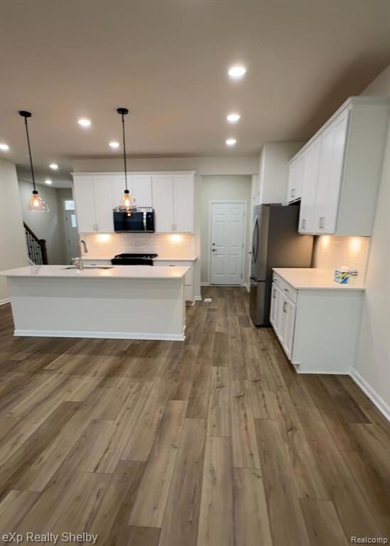 View from dining rm. into kitchen