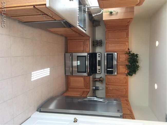 8266 Silver Birch Way, Lehigh Acres, FL 33971 - photo 3