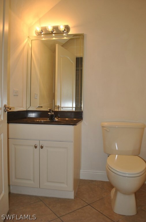 Downstairs 1/2 bath with upgraded cabinets & count