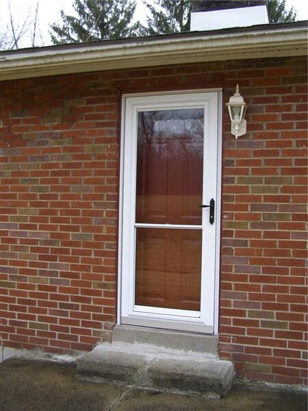 Both the door leading to the patio and the storm d