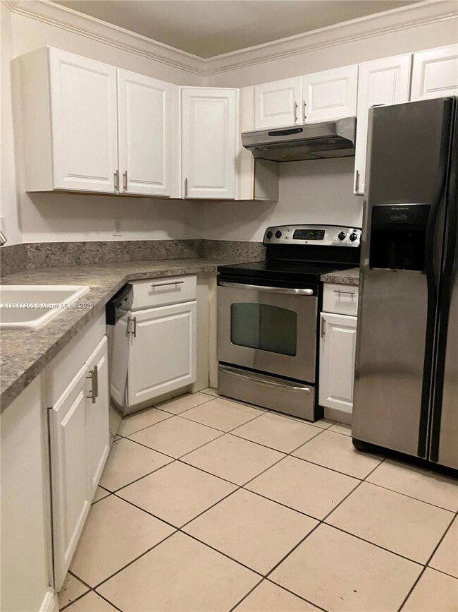 4025 W Mcnab Rd unit E102, Pompano Beach, FL 33069 - photo 3