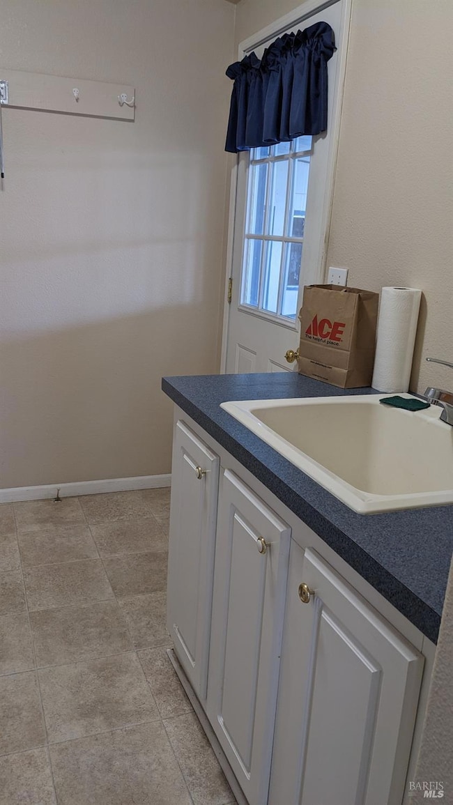 Back entry and laundry room. Access from ramp alon