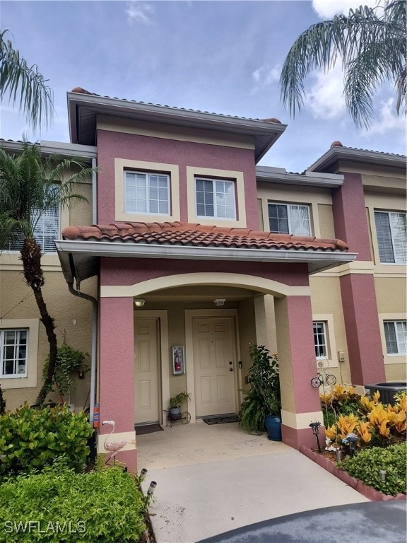 View of front of property featuring stucco siding