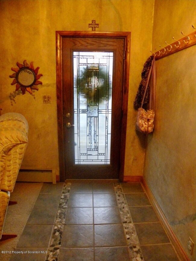 C'mon in! Welcome!  New front door, tile