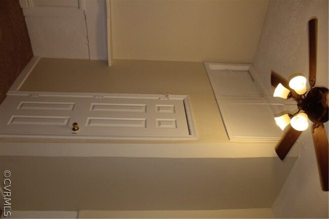 Living Room Storage over bathroom door
