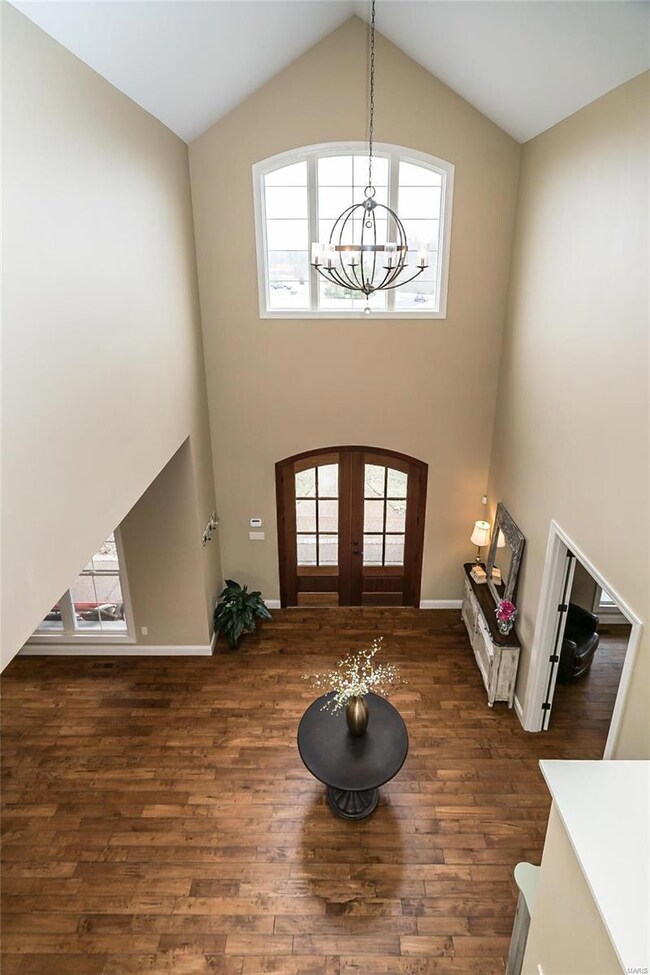 8 foot tall doors lead you into this magnificent f