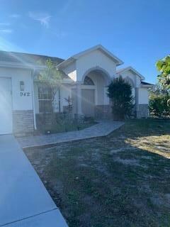 942 SW Mcdevitt Ave, Port Saint Lucie, FL 34953 - photo 2