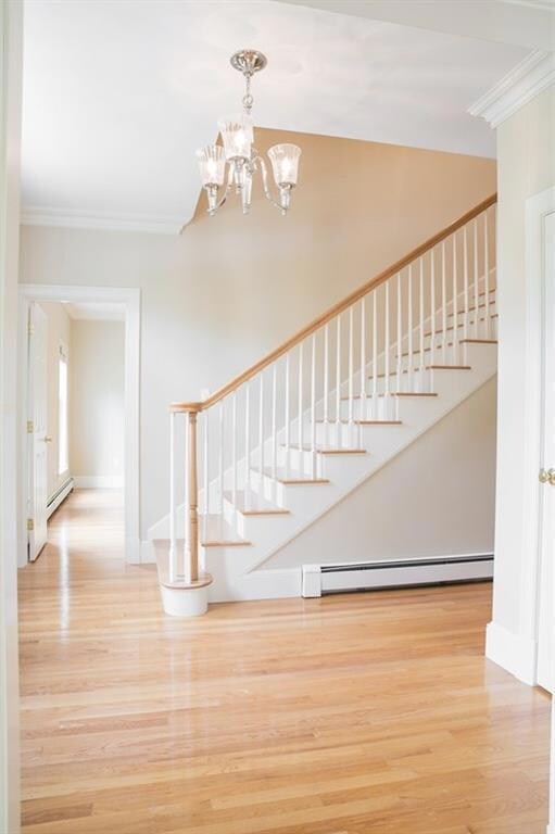 Spacious foyer with gleaming...
